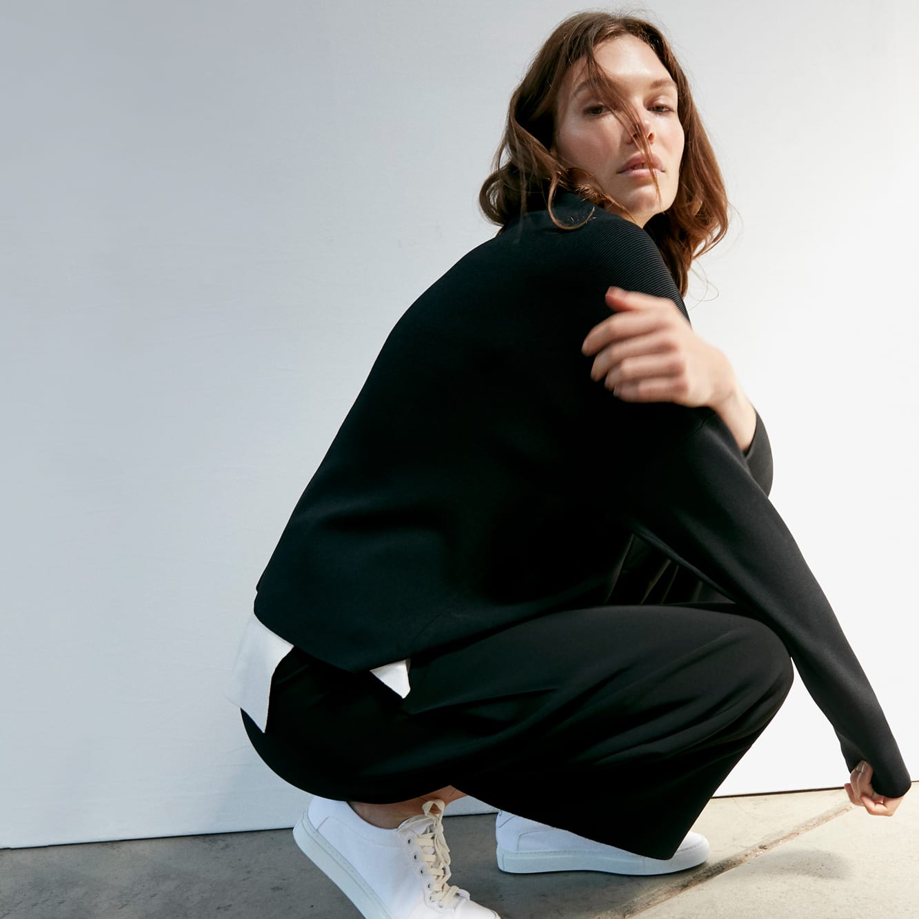 Woman wearing the Para pullover and Zhou cullote