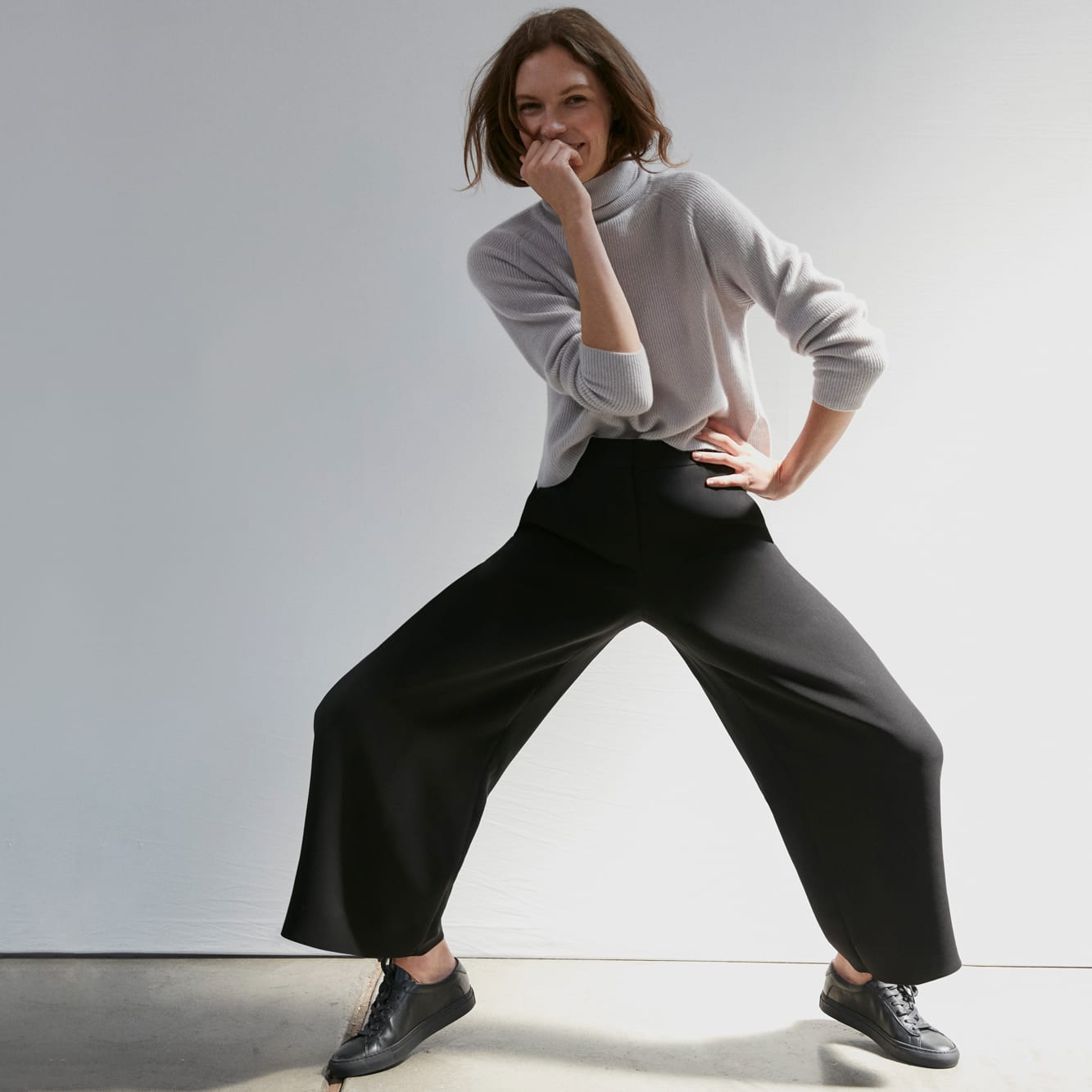 Woman wearing the Arbus sweater and Zhou culotte