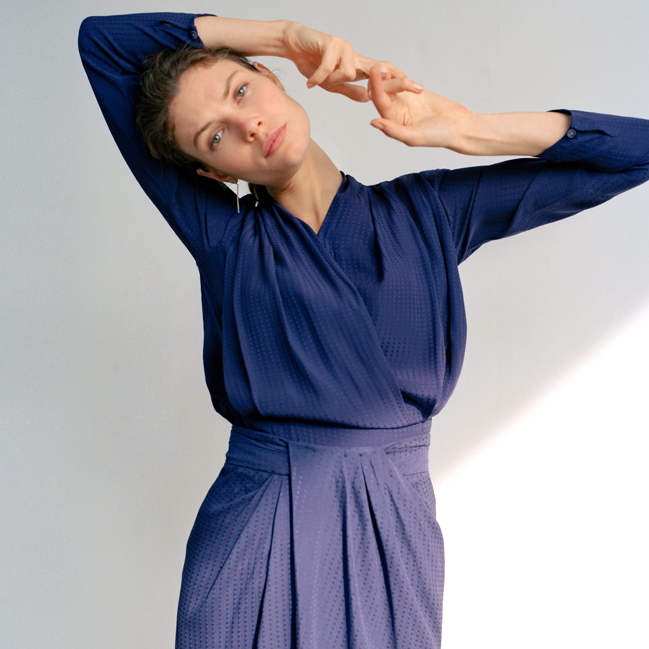 Woman wearing the Twyla top and Lenox skirt