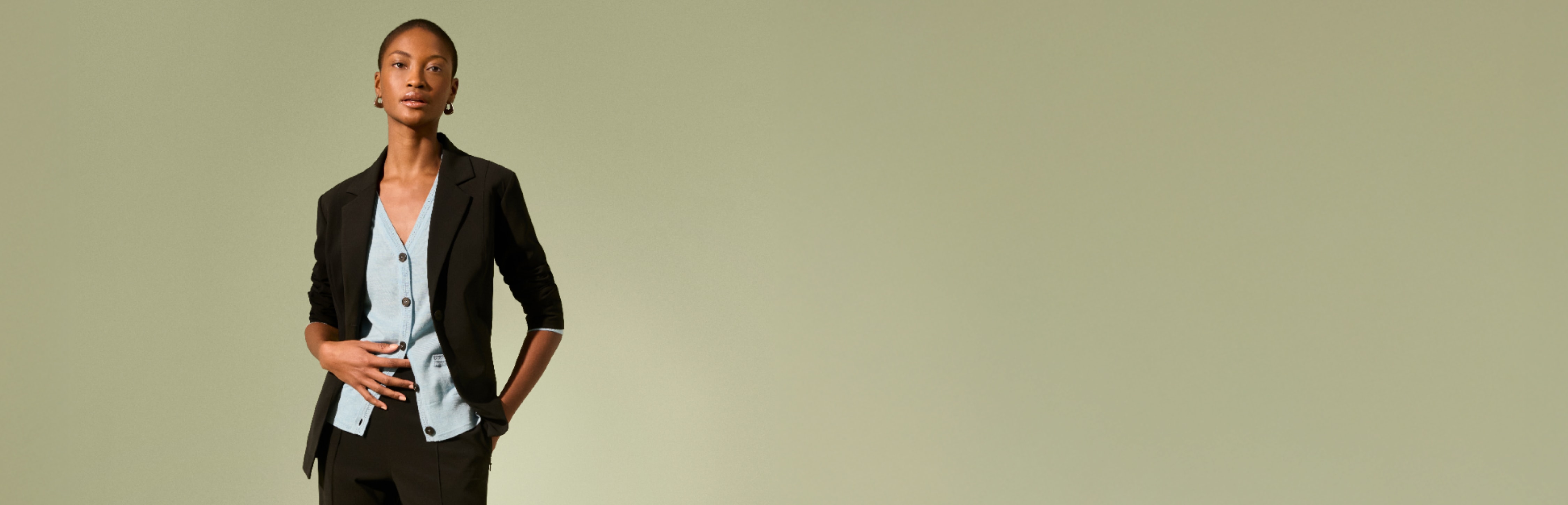 image of a woman wearing a black suit