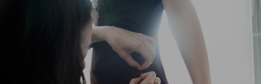 Designer working on a dress