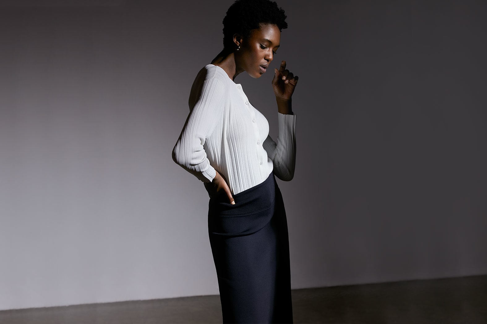 Woman wearing the Emerson cardigan