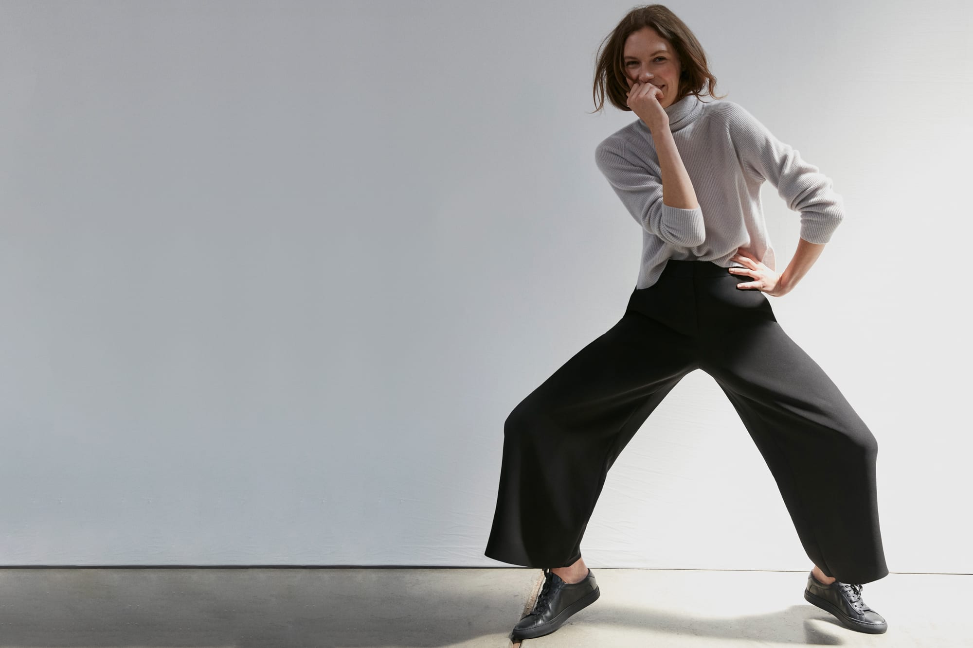Woman wearing the Arbus sweater and Zhou culotte