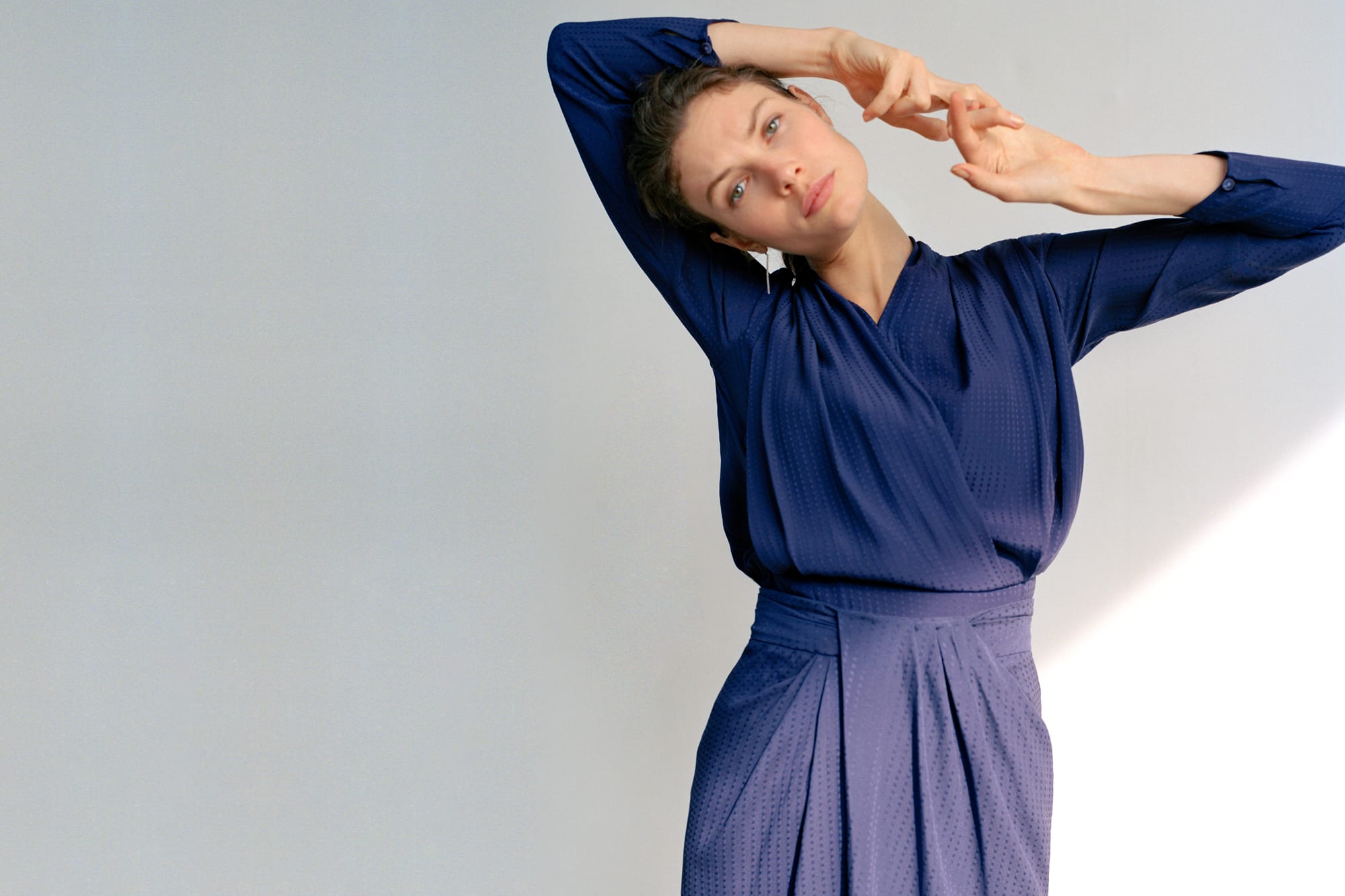 Woman wearing the Twyla top and Lenox skirt
