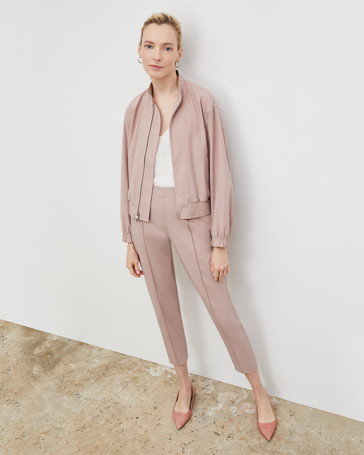 Woman in langley bomber and colby pant in blush