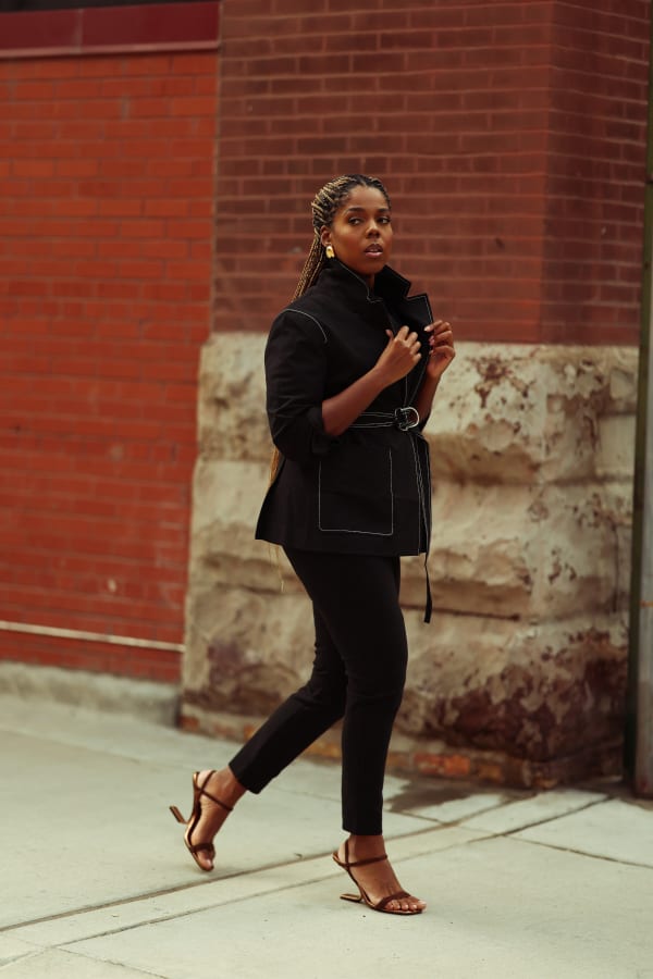 image of hayet rida wearing the grenville jacket in black with the skinny foster pants in black