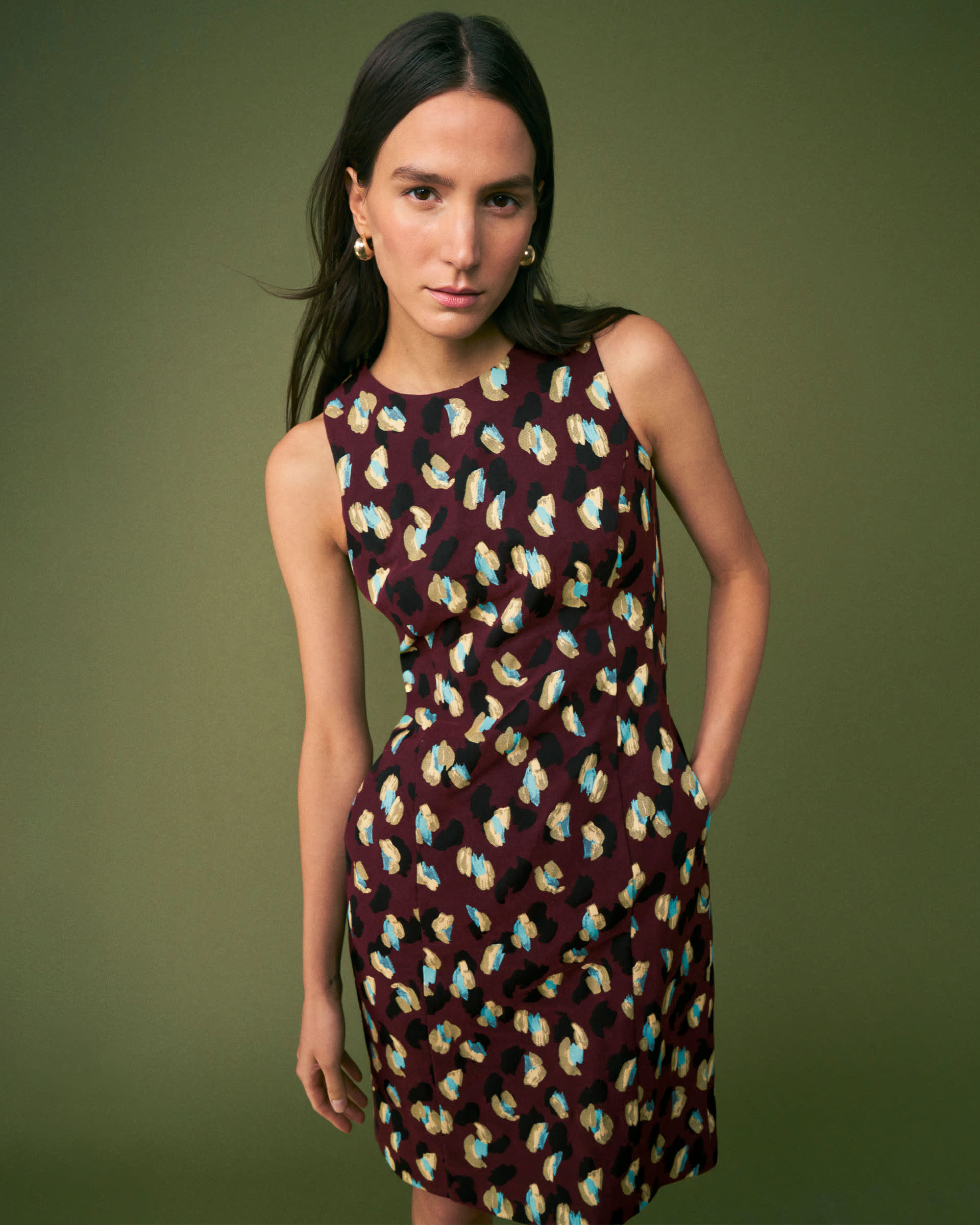 mood image of a woman wearing the constance dress in bengal jacquard