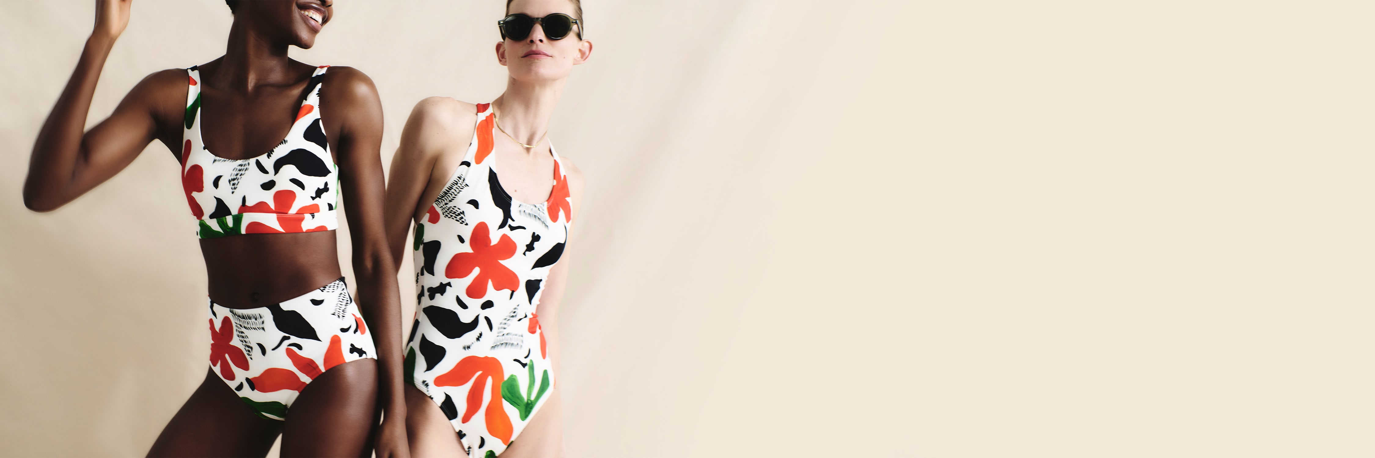 image of 2 women wearing floral swimsuits