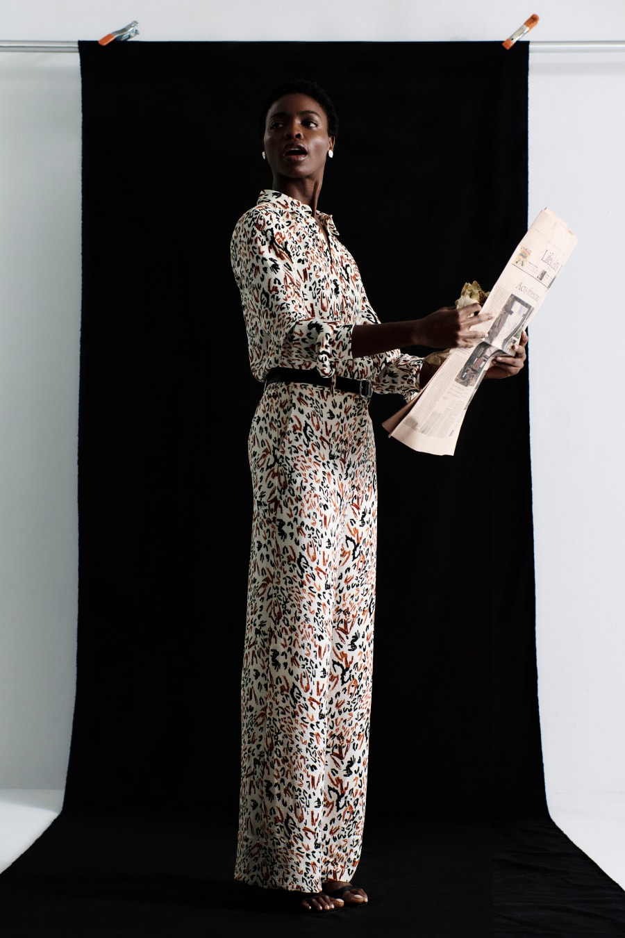 image of a woman wearing the lagarde top and tinsley pant in leopard sketch
