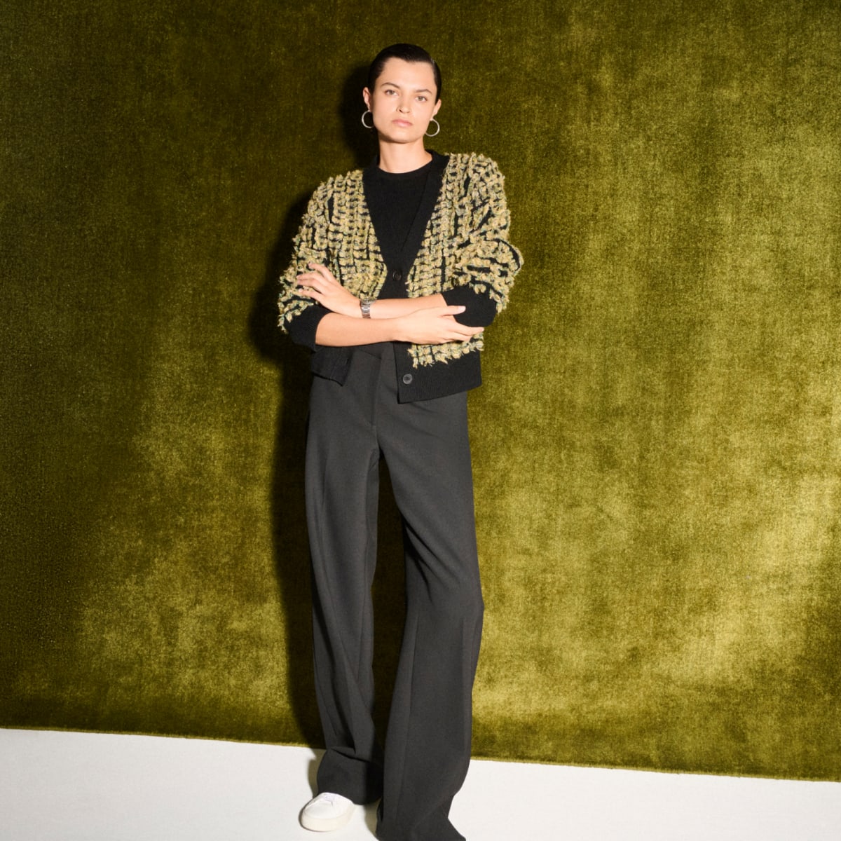 image of a woman wearing the rayna sweater in multi