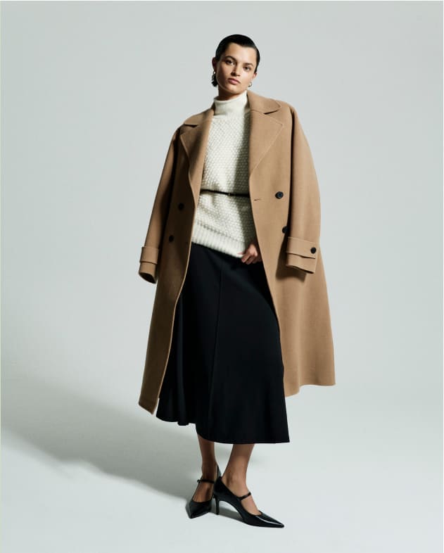 image of a woman wearing the viola coat in camel