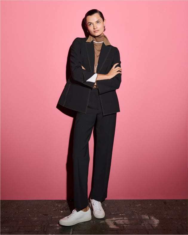 Image of a woman wearing a luxe wool suit