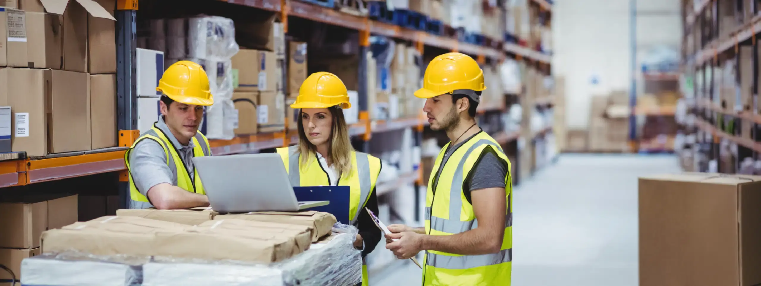 Warehouse worker scanning a package beside a daily operations checklist for 3PLs