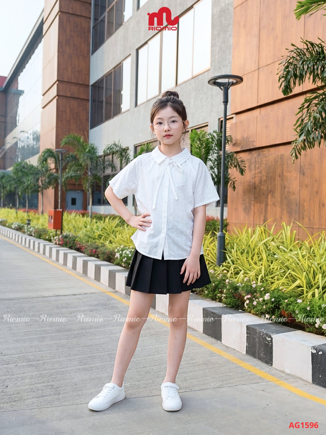 Sơ mi cộc tay trắng dáng rộng bé gái (6–12 tuổi)