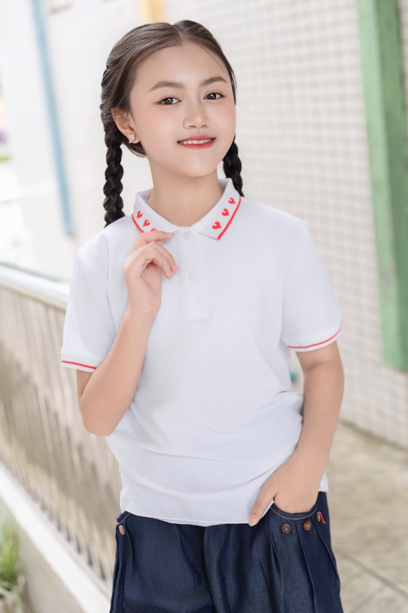 Áo polo bé gái dệt tym 6-12 tuổi