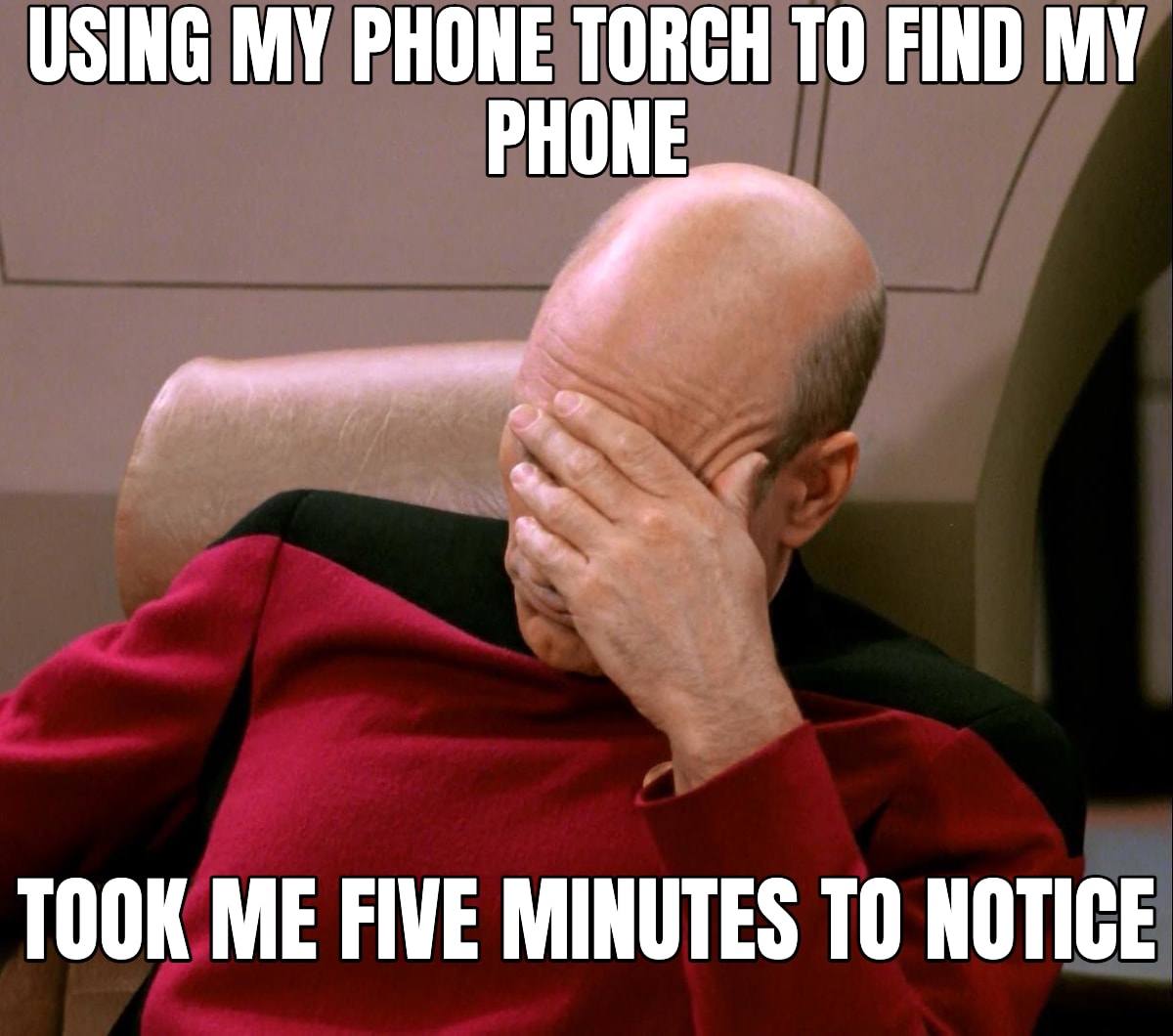 Facepalm meme: USING MY PHONE TORCH TO FIND MY PHONE — took me five minutes to notice