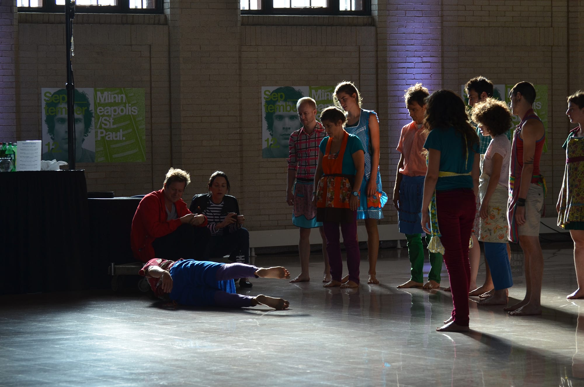 Doug Aitken watching a dance piece rehearse. 