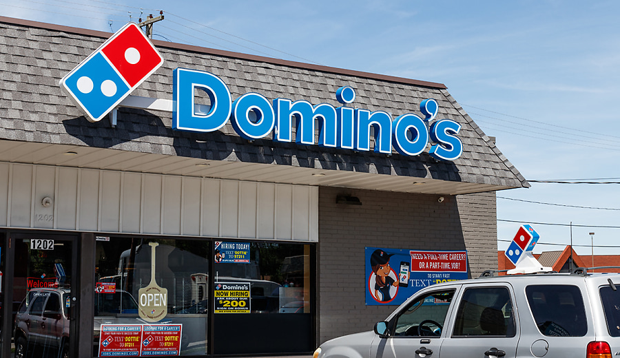 Dominos facing class action