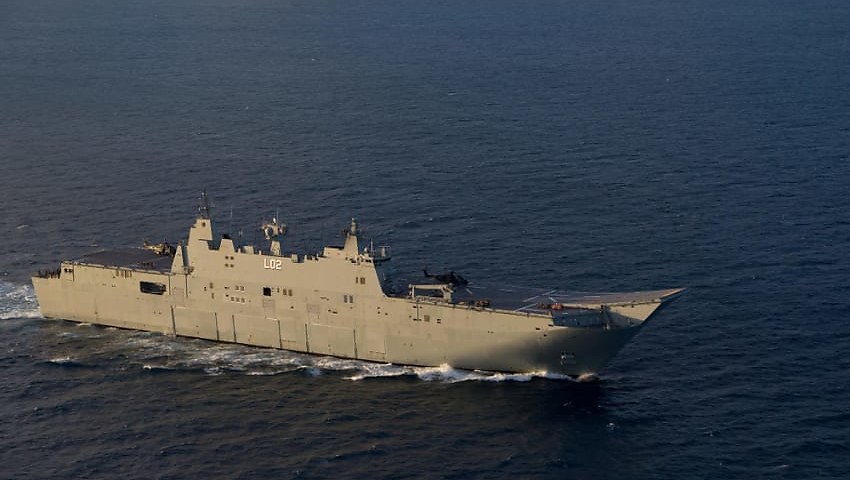 HMAS Canberra en route to home port following regional deployment