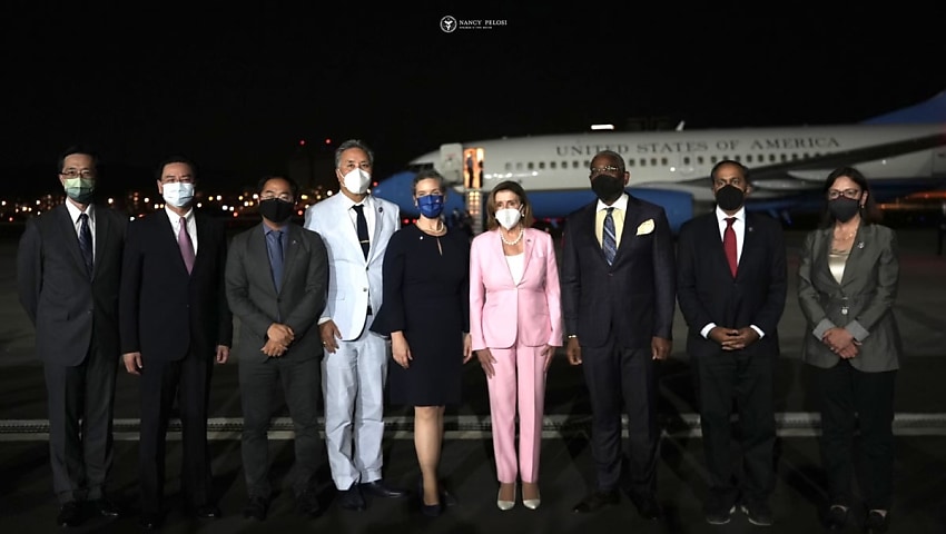 Tensions flare as Pelosi touches down in Taiwan