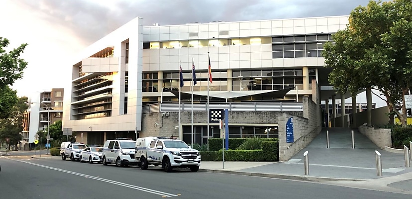 NSW woman in custody after accessing government computer to aid crime