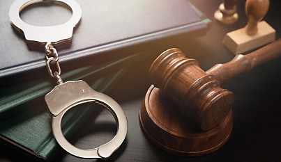 NSW corrections officer charged over alleged smuggling of encrypted phone into prison