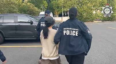 Chinese nationals charged with foreign interference after spying for China’s Public Security Bureau