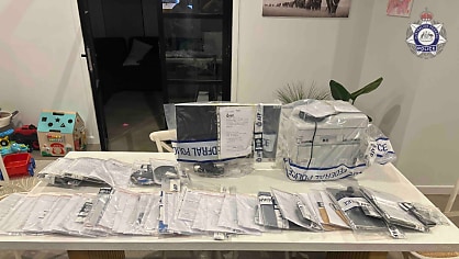 NSW man charged over mobile phishing scheme