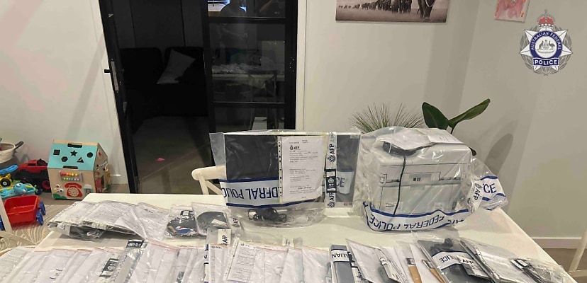 NSW man charged over mobile phishing scheme