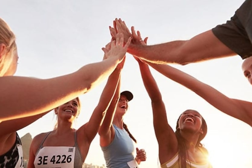 How Team Sports Can Enhance Your Workplace