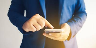 man using smartphone lw