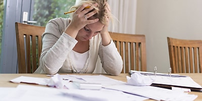stressed woman financial ad e7gnu5