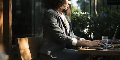 businesswoman working ad at hl7h75