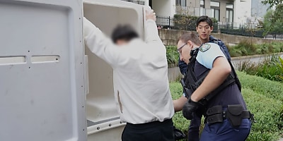 NSW banker arrest bd ofseif