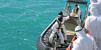 RAN sailors from HMAS Brisbane prepare to board an inflatable boat to search for the missing Taipan crew  Defence LSEW Hannah Linsley arub6s
