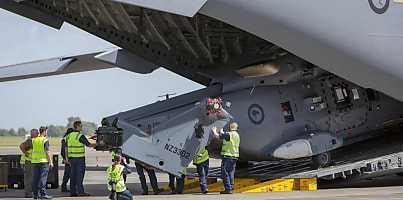 NH90 Taipan being unloaded dc jvniu2