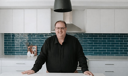 Greg in kitchen g9k3ej