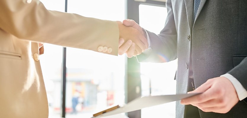 business handshake deal reb imhbwr