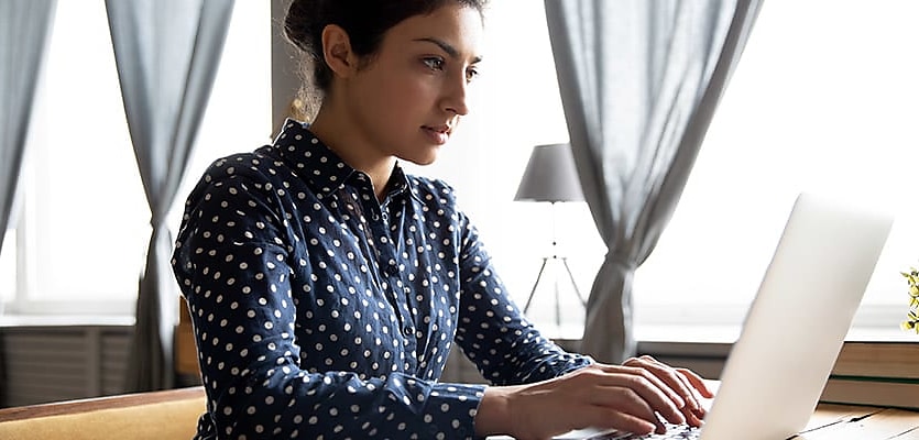 woman using laptop reb