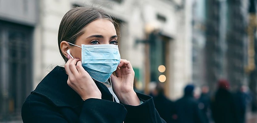 woman wearing mask reb