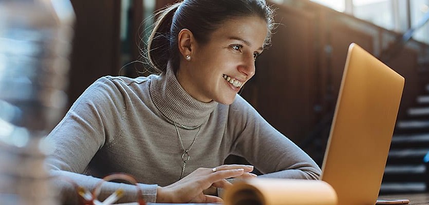 young woman laptop reb