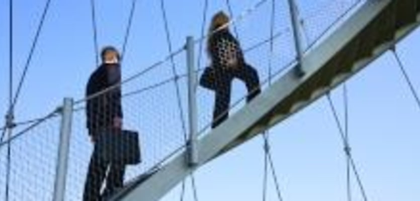 business people climbing stairs