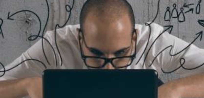 man on computer