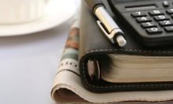 calculator folder newspaper