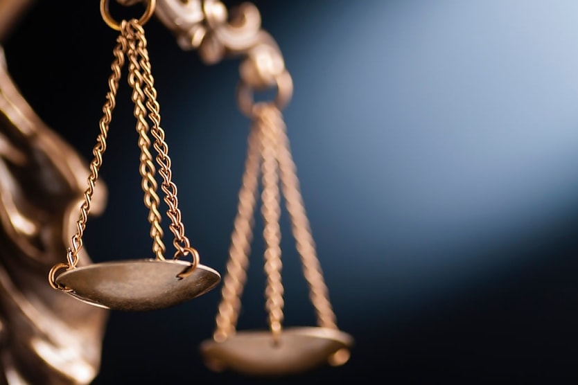 Teacher Facing Assault Charges Delays Unfair Dismissal Matter
