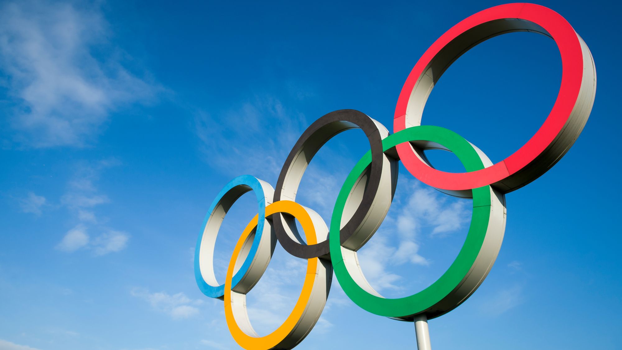https://res.cloudinary.com/momentum-media-group-pty-ltd/image/upload/v1/Money%20Management/olympic-rings-mm_htatxg.jpg