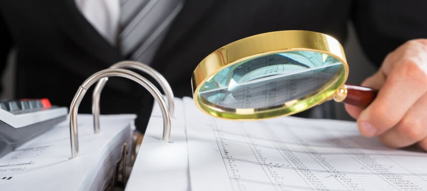 magnifying scrutiny ta