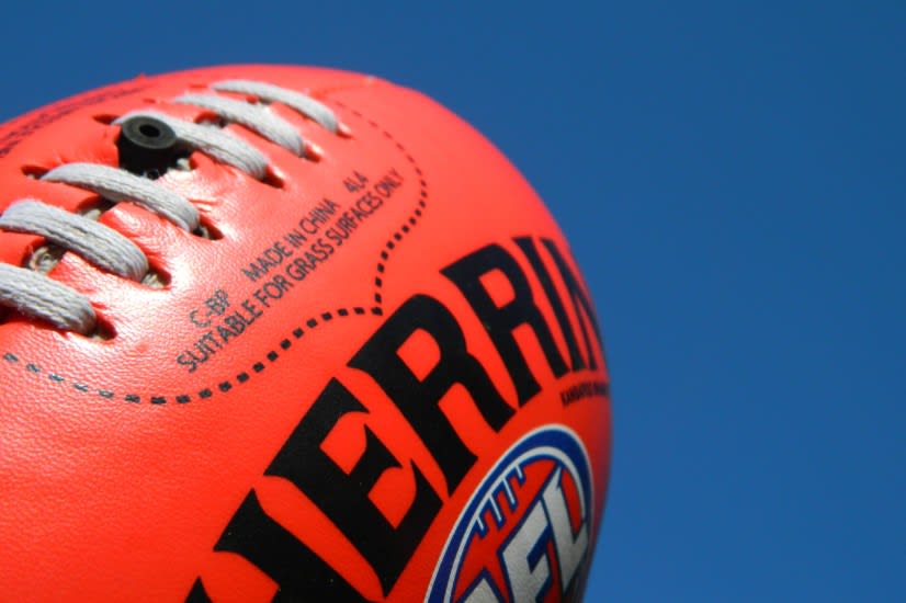 https://res.cloudinary.com/momentum-media-group-pty-ltd/image/upload/v1655100493/Nestegg/article-826x550/AFL_ball_ne.jpg