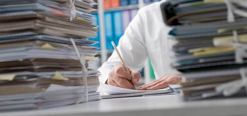 https://res.cloudinary.com/momentum-media-group-pty-ltd/image/upload/v1655372632/Real%20Estate%20Business/intro-images/Articles_850x400/person-paperworks-reb.jpg