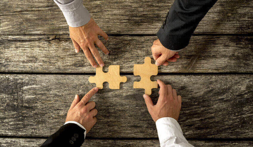 https://res.cloudinary.com/momentum-media-group-pty-ltd/image/upload/v1655738640/Lawyers%20Weekly/articleImages-850x492/puzzle-acquire-hands.jpg